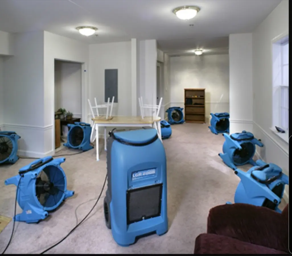 Air movers and dehumidifier setup for Water Damage Restoration in Wixom